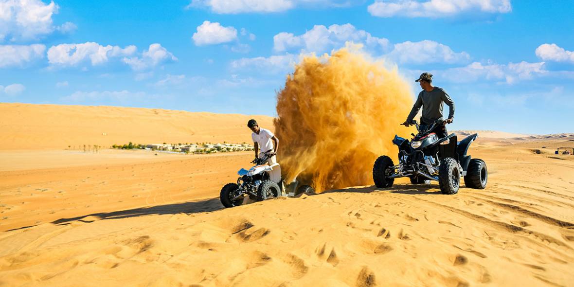 Quad adventure through the Omani desert dunes