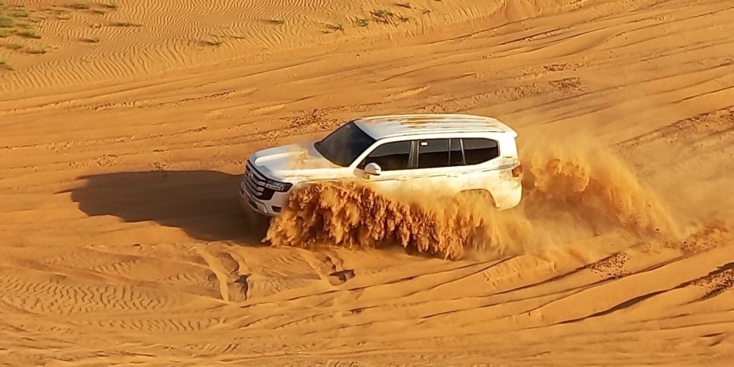 Sunset Dune Adventure: Thrills in a 4x4 Land Cruiser