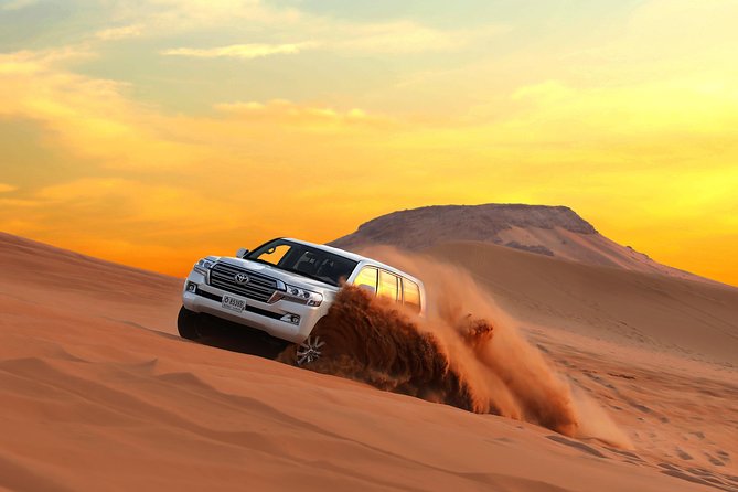 Dune Bashing & Sunset Experience with Authentic Omani Refreshments Setup